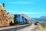 CR, Conrail 6162- 6154- 3284, in unfamiliar territory with a westbound on the AT&SF, Santa Fe at, Valentine, Arizona. May 2, 1996. 